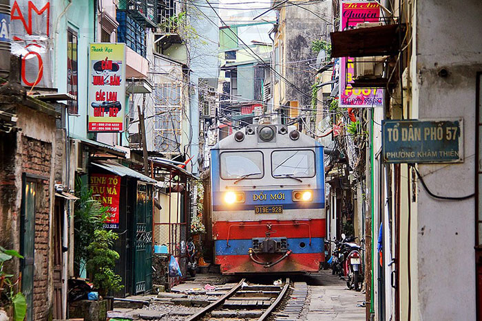 street train in Hanoi passing train